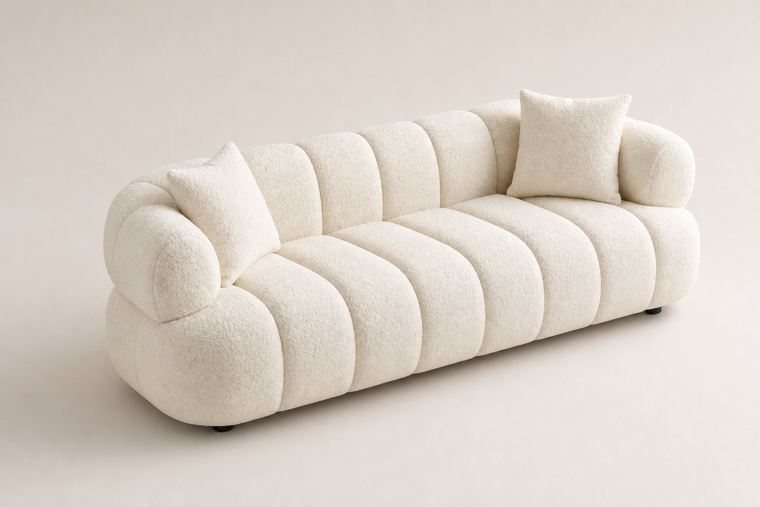COLIANI : Le style matelassé enveloppant en blanc cassé