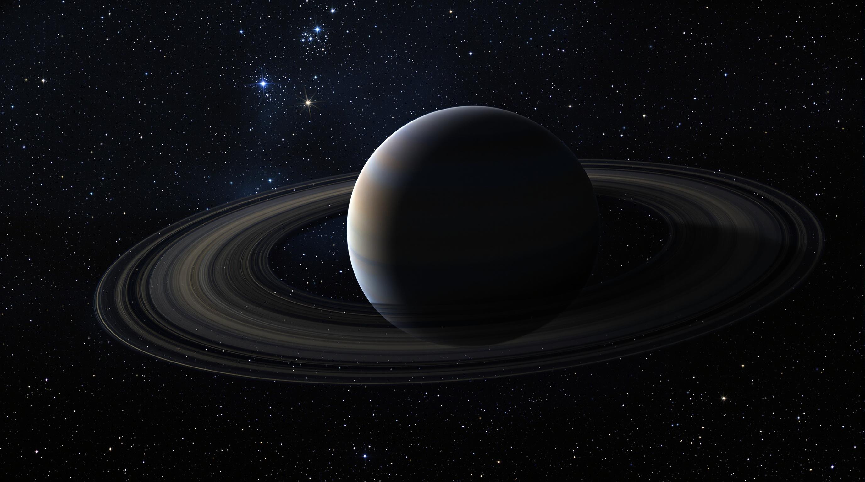 Une vue spectaculaire de Saturne, mettant en évidence ses anneaux complexes et colorés, avec un fond étoilé profond. L'image doit illustrer la structure détaillée des anneaux, avec des variations de densité et de couleur visibles.