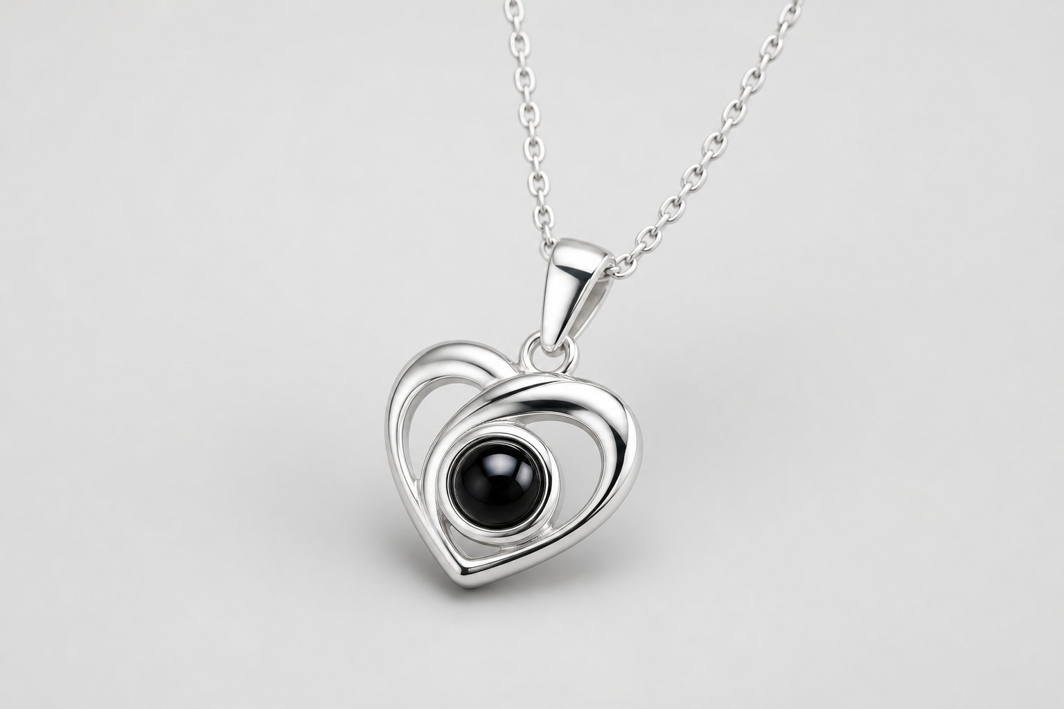 Pendentif cœur projection photo - Le secret d'un regard complice