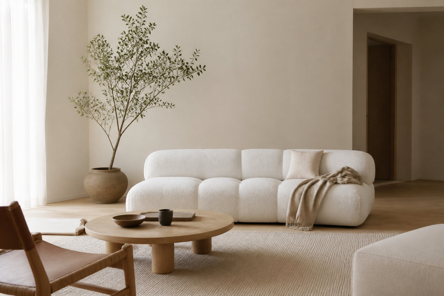 Canapé minimaliste OSTUNI : le sanctuaire de modernité bouclette