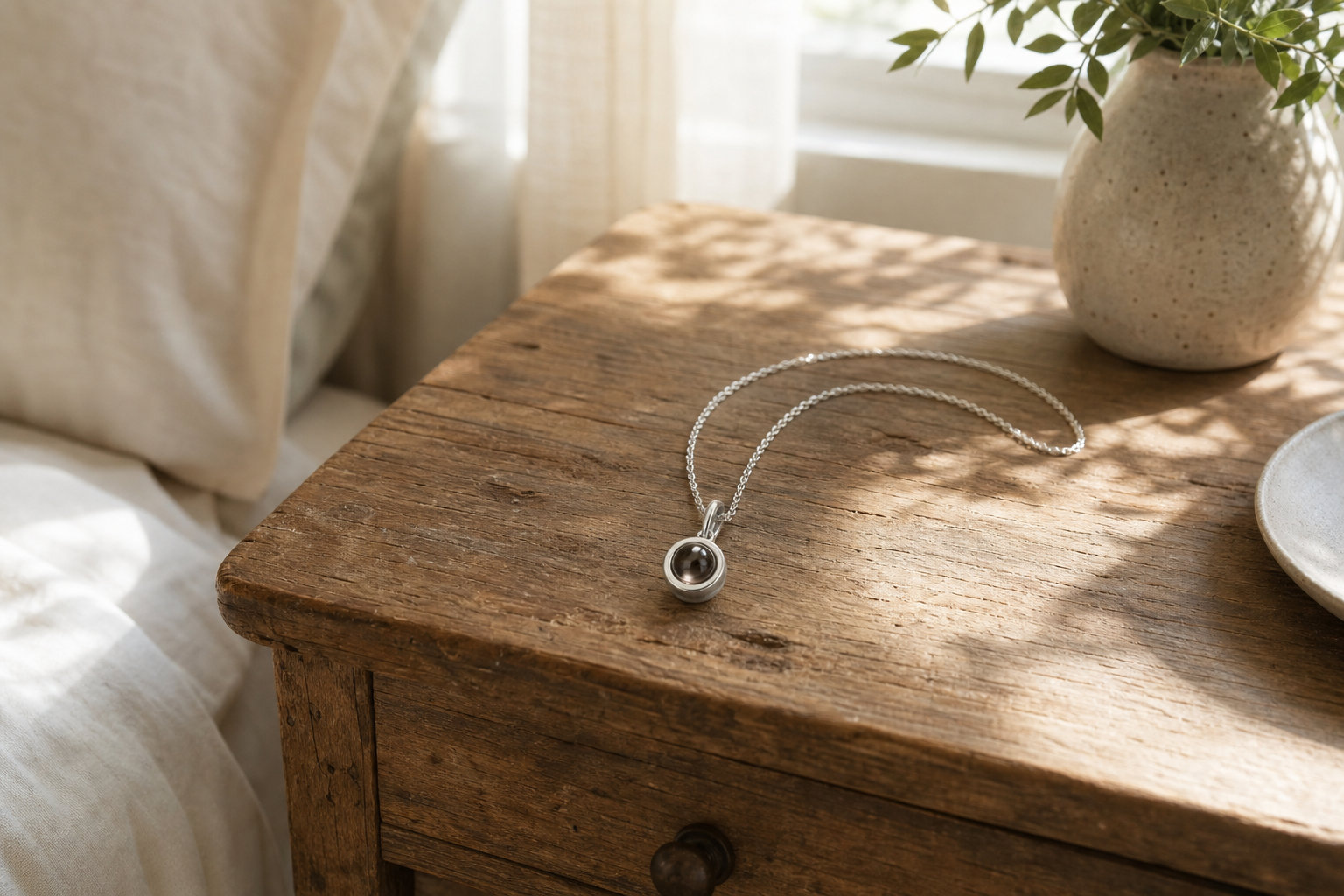 Pendentif Projection Photo : la discrétion au service du sentiment