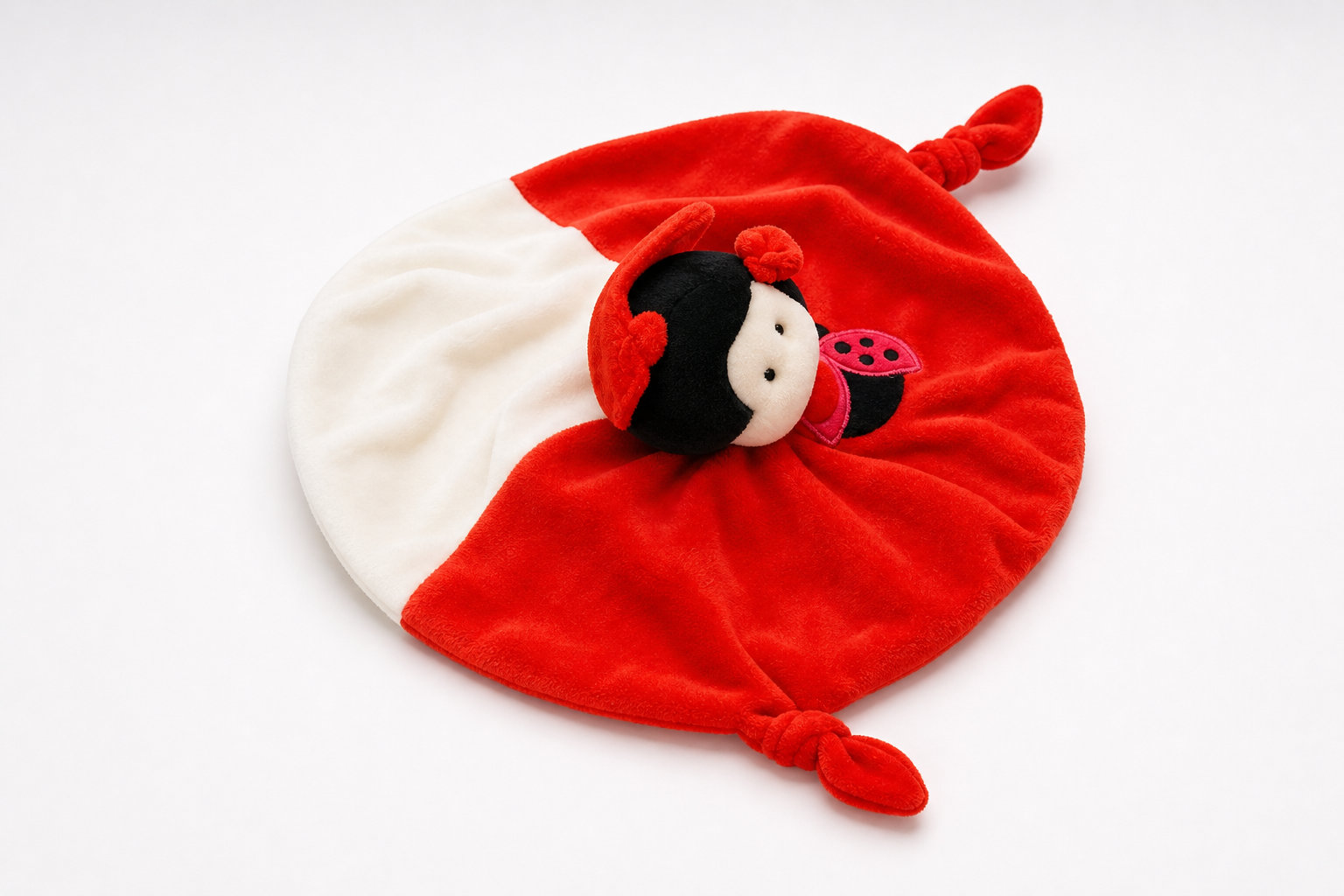 Doudou Coccinelle : une amie colorée et unique