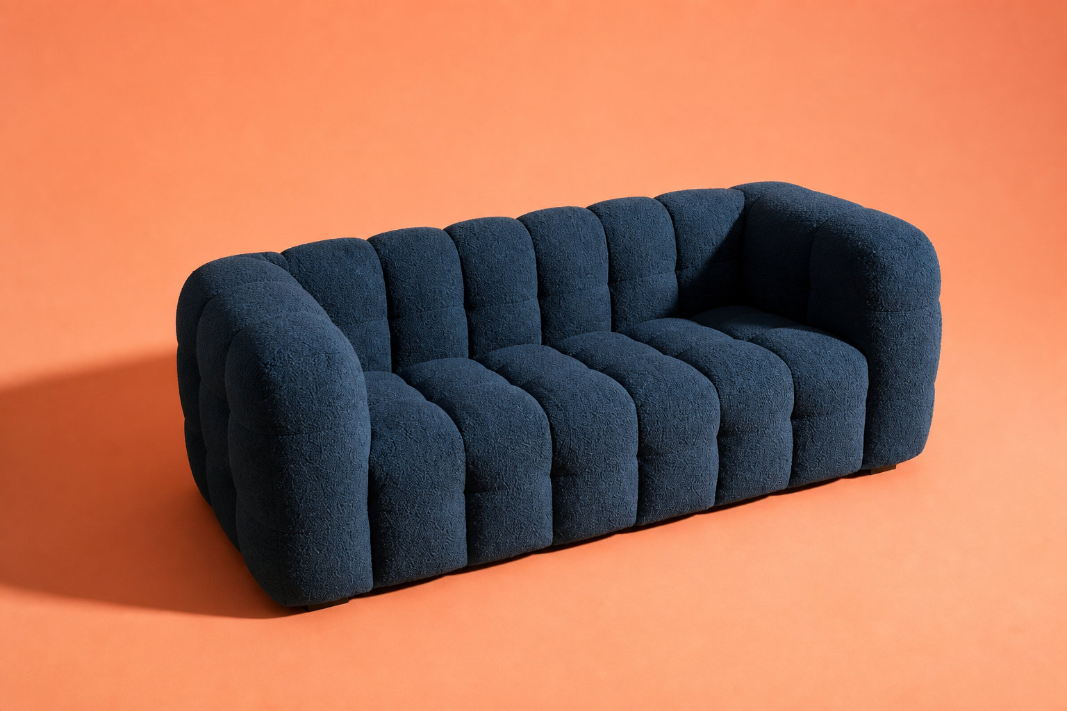 Canapé nuage LILO en bouclette bleu nuit : le cocon texturé