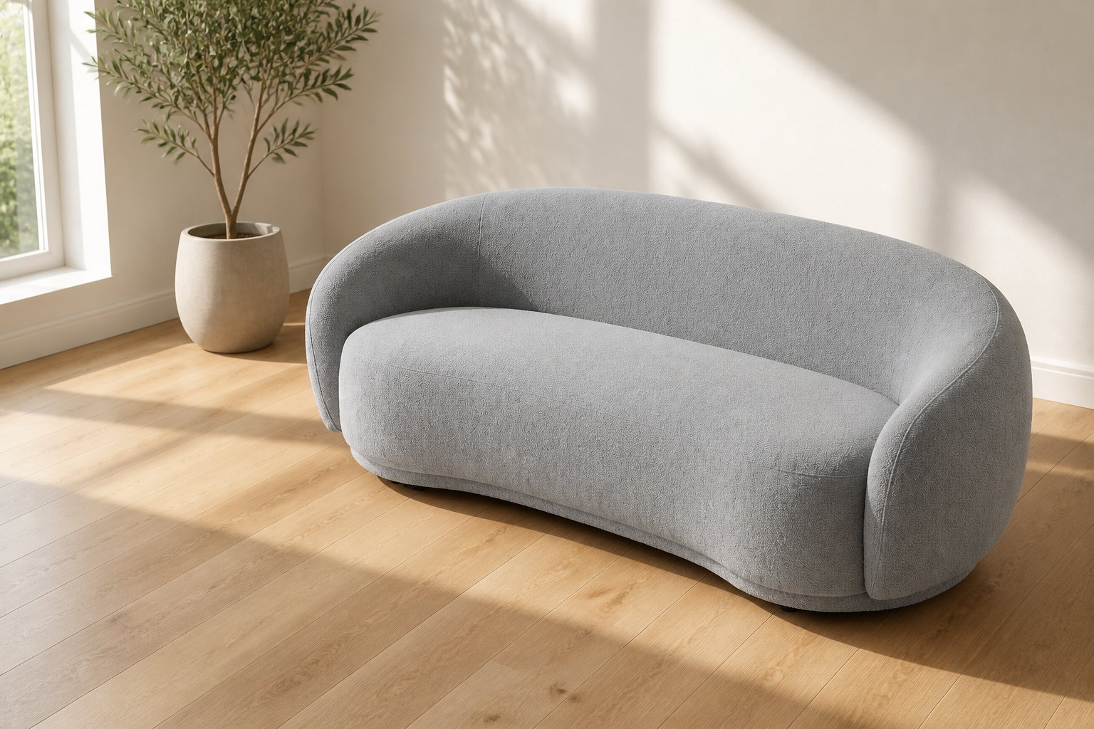 Canapé arrondi BOVANA en bouclette gris : une sérénité moderne et enveloppante