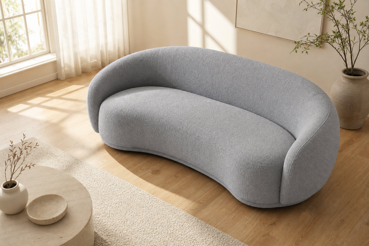 Canapé BOVANA gris : une silhouette fluide pour votre salon