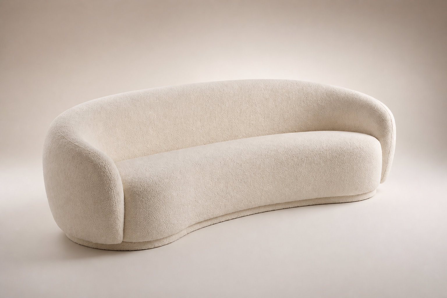 Canapé arrondi organique BOVANA beige : la fluidité des lignes contemporaines